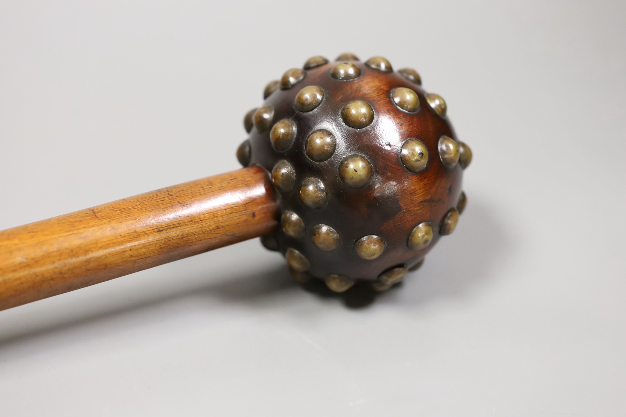A 19th century Zulu studded hardwood knobkerrie, 65cm long